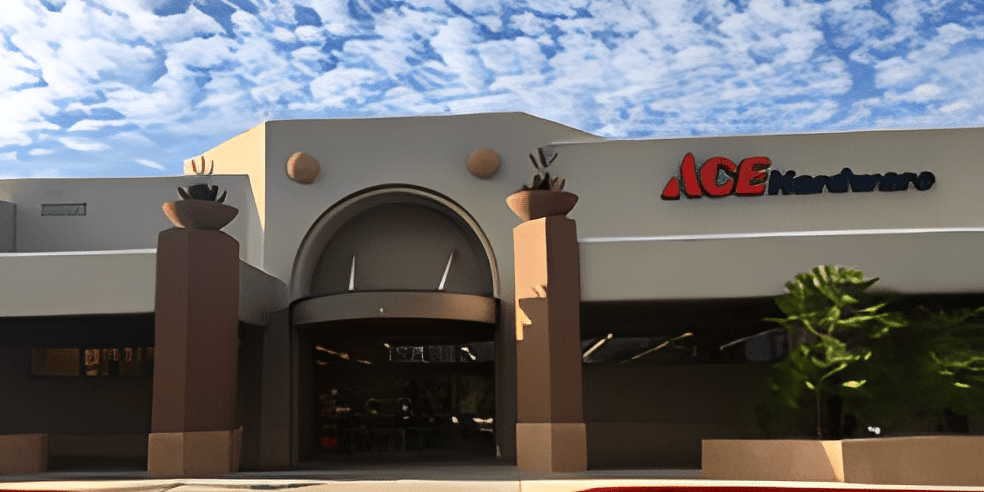 Hardware store entrance under blue sky